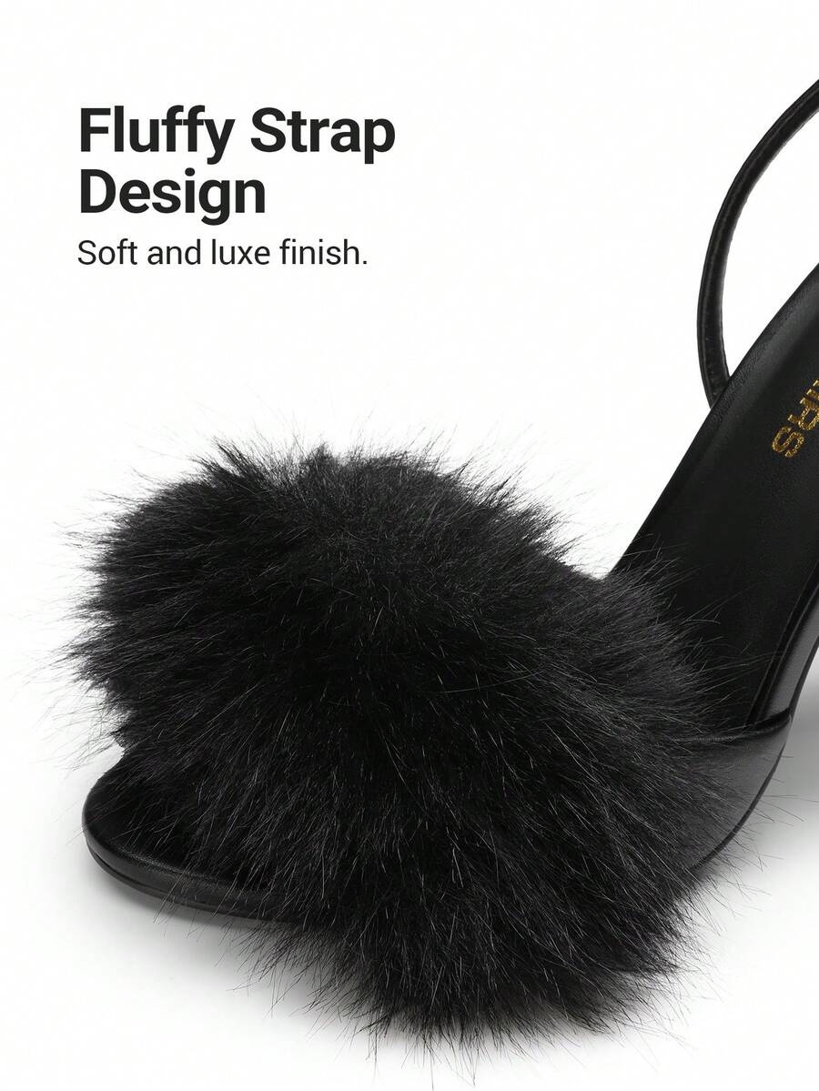 Women's open toe stiletto heeled sandals with fluffy feather detail and adjustable buckle ankle strap.