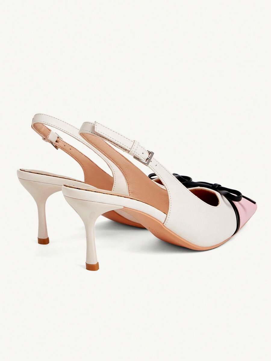Pointed toe stiletto high heel pumps featuring black lace mesh upper, buckle slingback detail, and sleek slip-on design for weddings and evening wear.