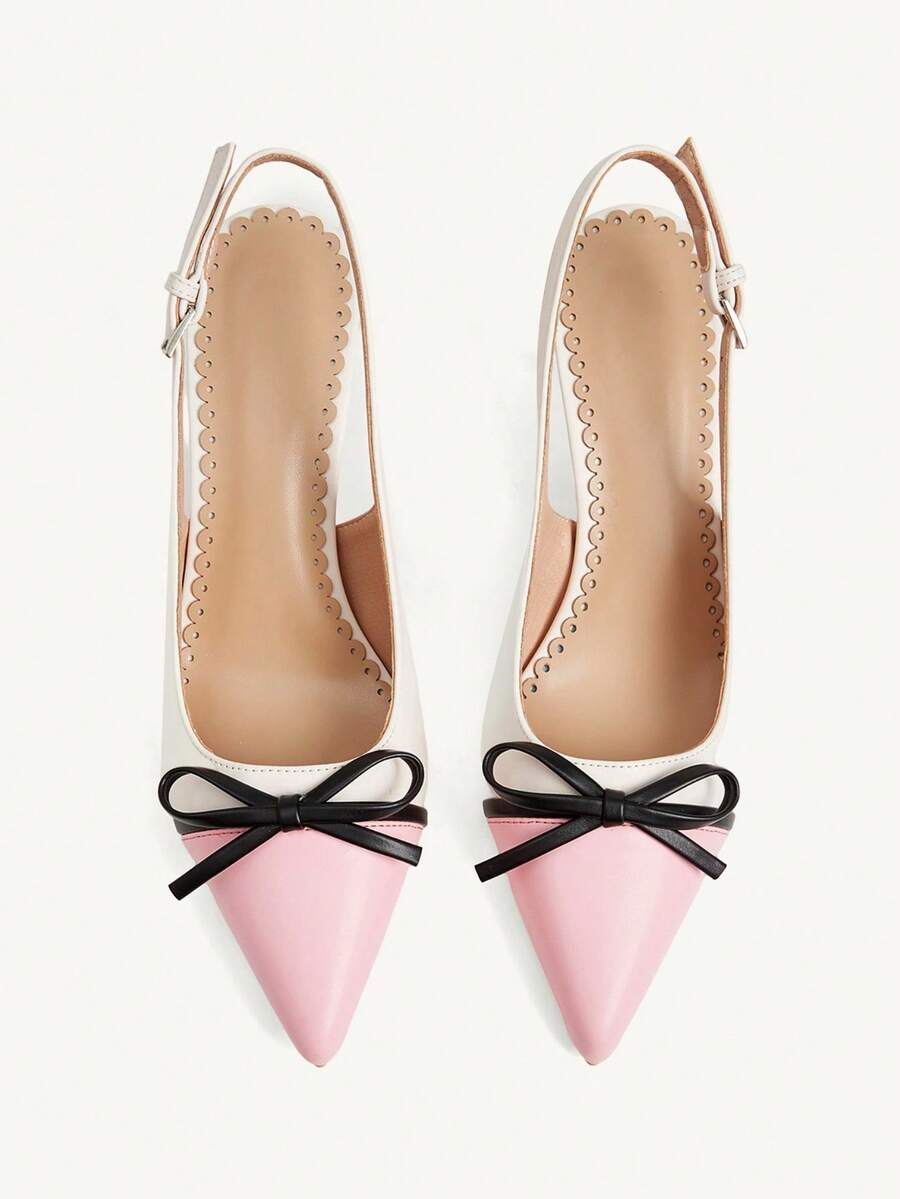 Pointed toe stiletto high heel pumps featuring black lace mesh upper, buckle slingback detail, and sleek slip-on design for weddings and evening wear.