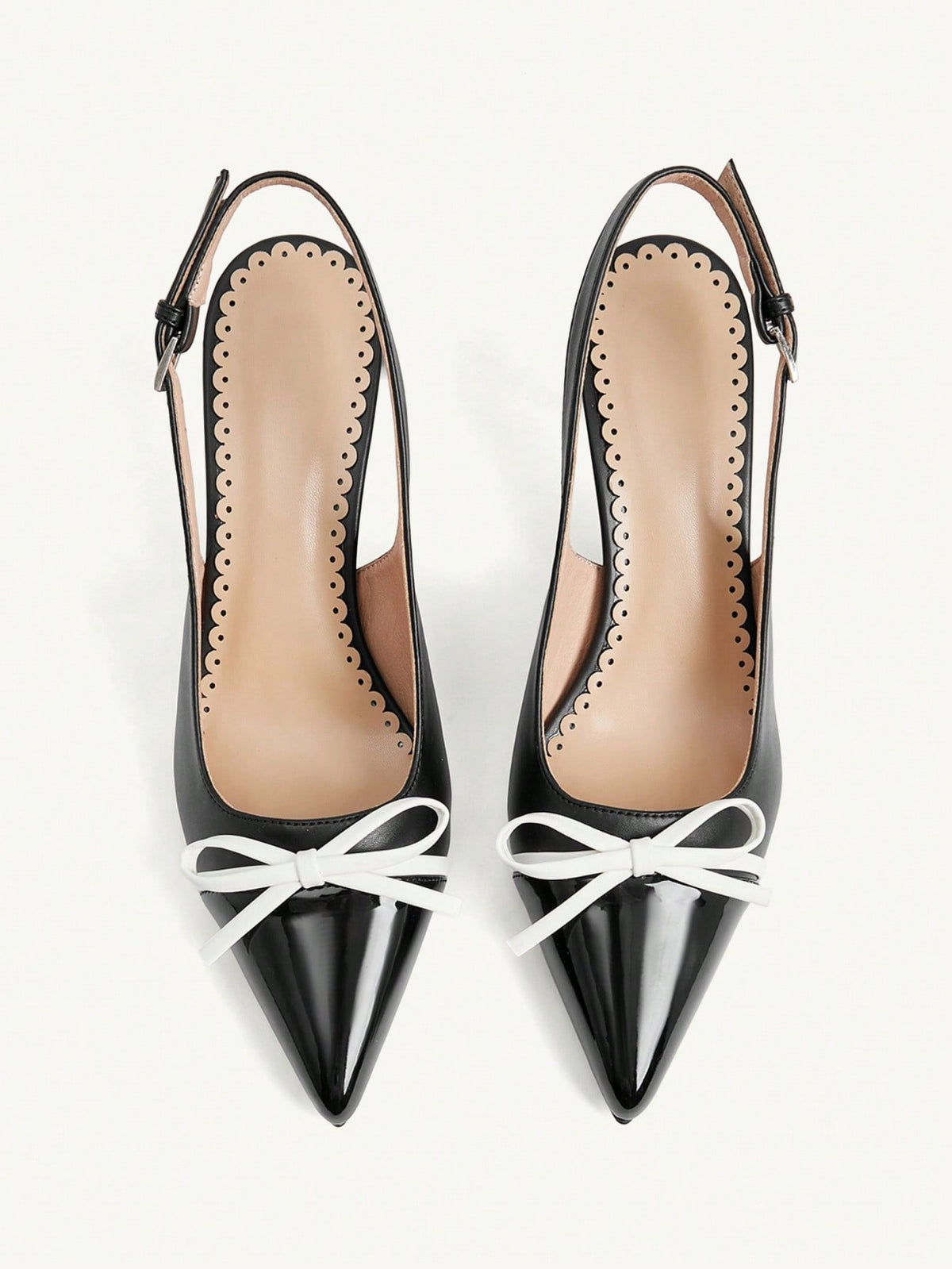 Pointed toe stiletto high heel pumps featuring black lace mesh upper, buckle slingback detail, and sleek slip-on design for weddings and evening wear.