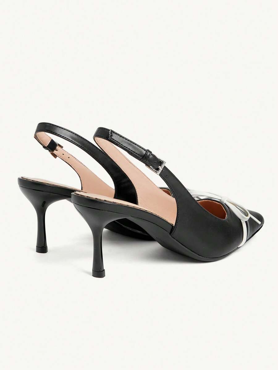 Pointed toe stiletto high heel pumps featuring black lace mesh upper, buckle slingback detail, and sleek slip-on design for weddings and evening wear.