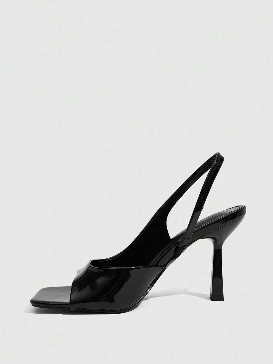Women's burgundy open toe high heel sandals featuring an embossed finish and slingback strap