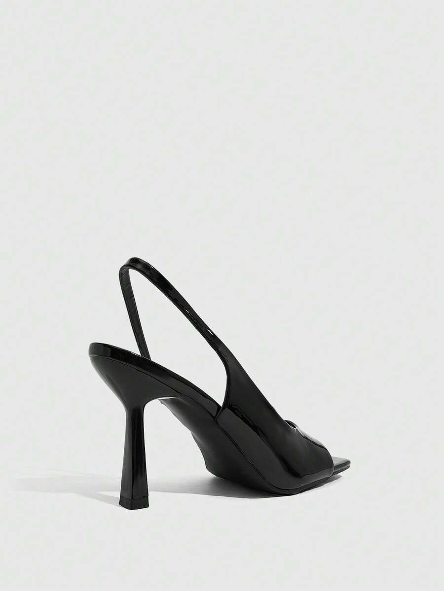 Women's burgundy open toe high heel sandals featuring an embossed finish and slingback strap