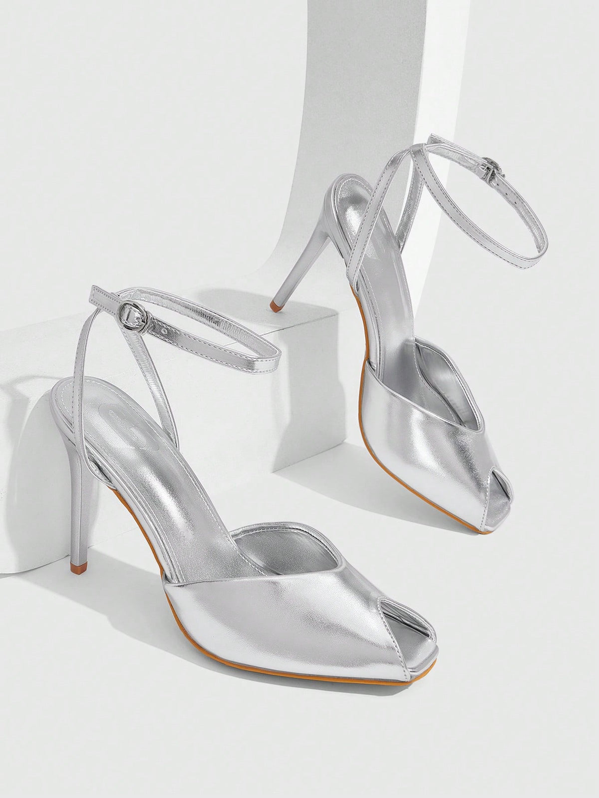 Silver stiletto heeled sandals with square peep toe and one-line buckle ankle strap