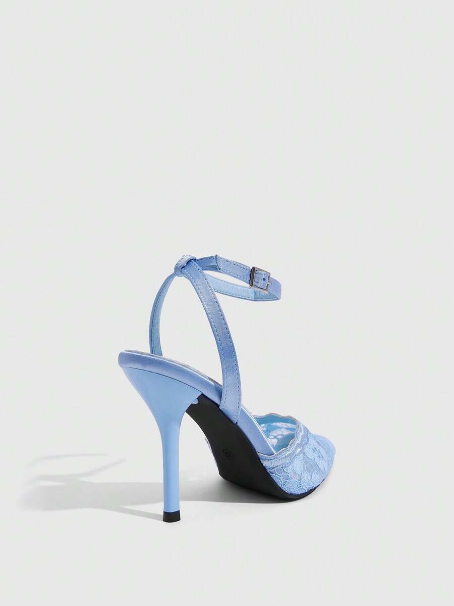 Women's stiletto high heel shoes featuring an elegant buckle detail and ankle strap slingback design.