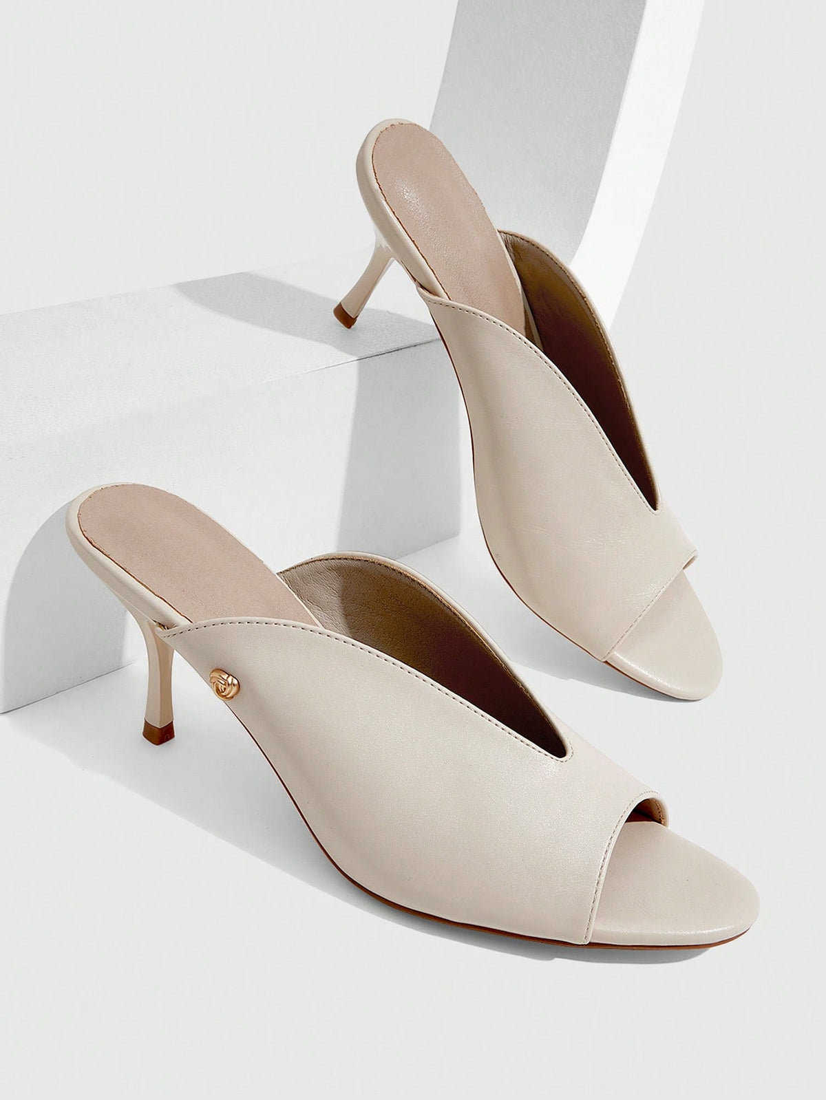 Women's open toe slingback platform sandals featuring a stiletto mid heel and smooth PU leather finish