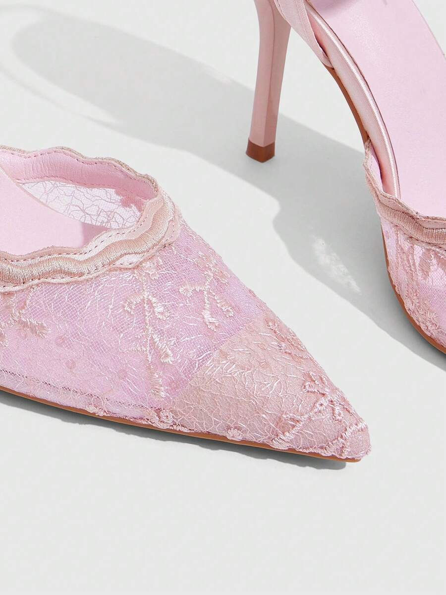 Women's stiletto high heel shoes featuring an elegant buckle detail and ankle strap slingback design.