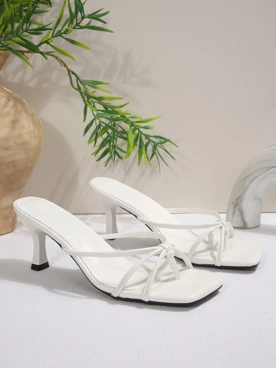 Women's open toe high heel slingback sandals with pyramid heel in solid color PU leather.