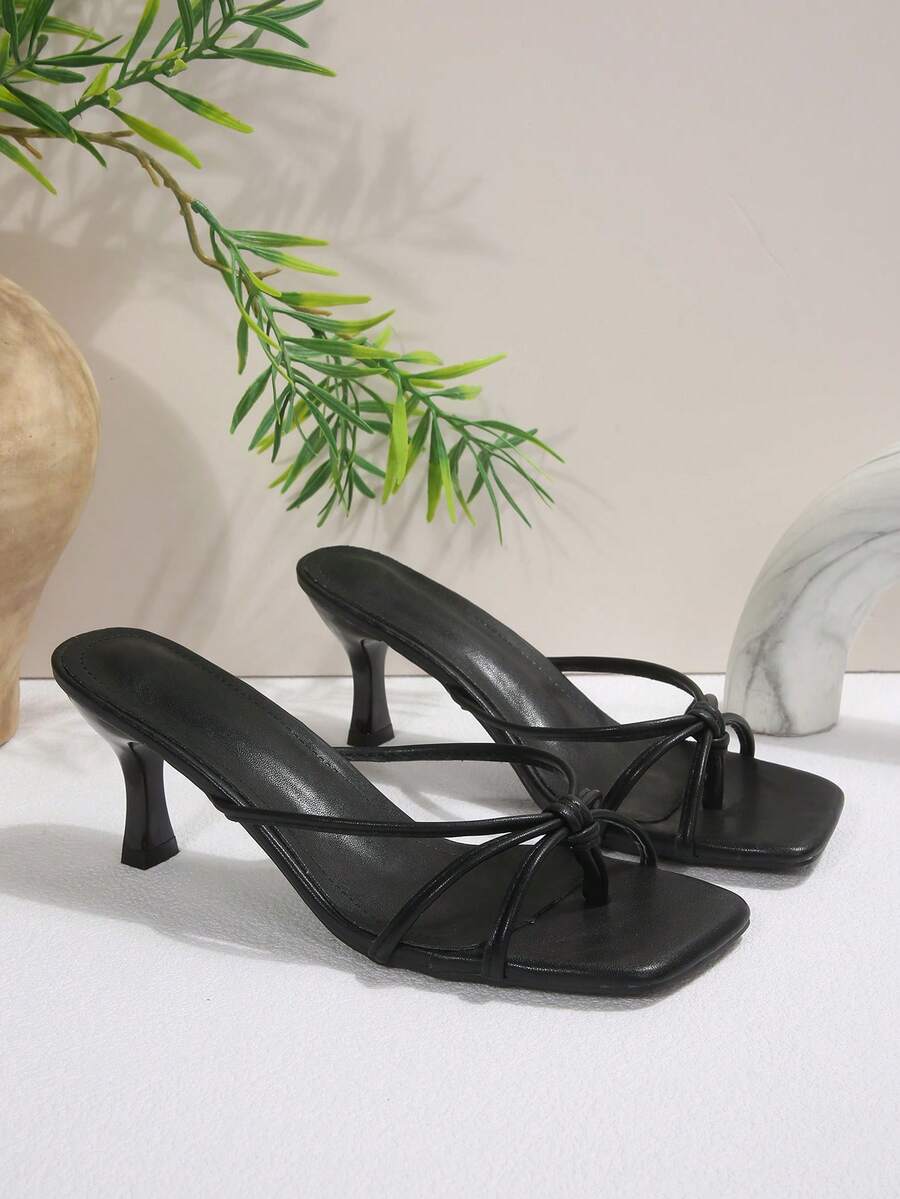 Women's open toe high heel slingback sandals with pyramid heel in solid color PU leather.