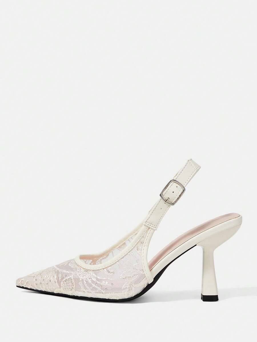 Pointed toe stiletto high heel pumps featuring black lace mesh upper, buckle slingback detail, and sleek slip-on design for weddings and evening wear.