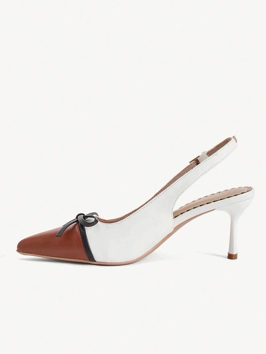 Pointed toe stiletto high heel pumps featuring black lace mesh upper, buckle slingback detail, and sleek slip-on design for weddings and evening wear.