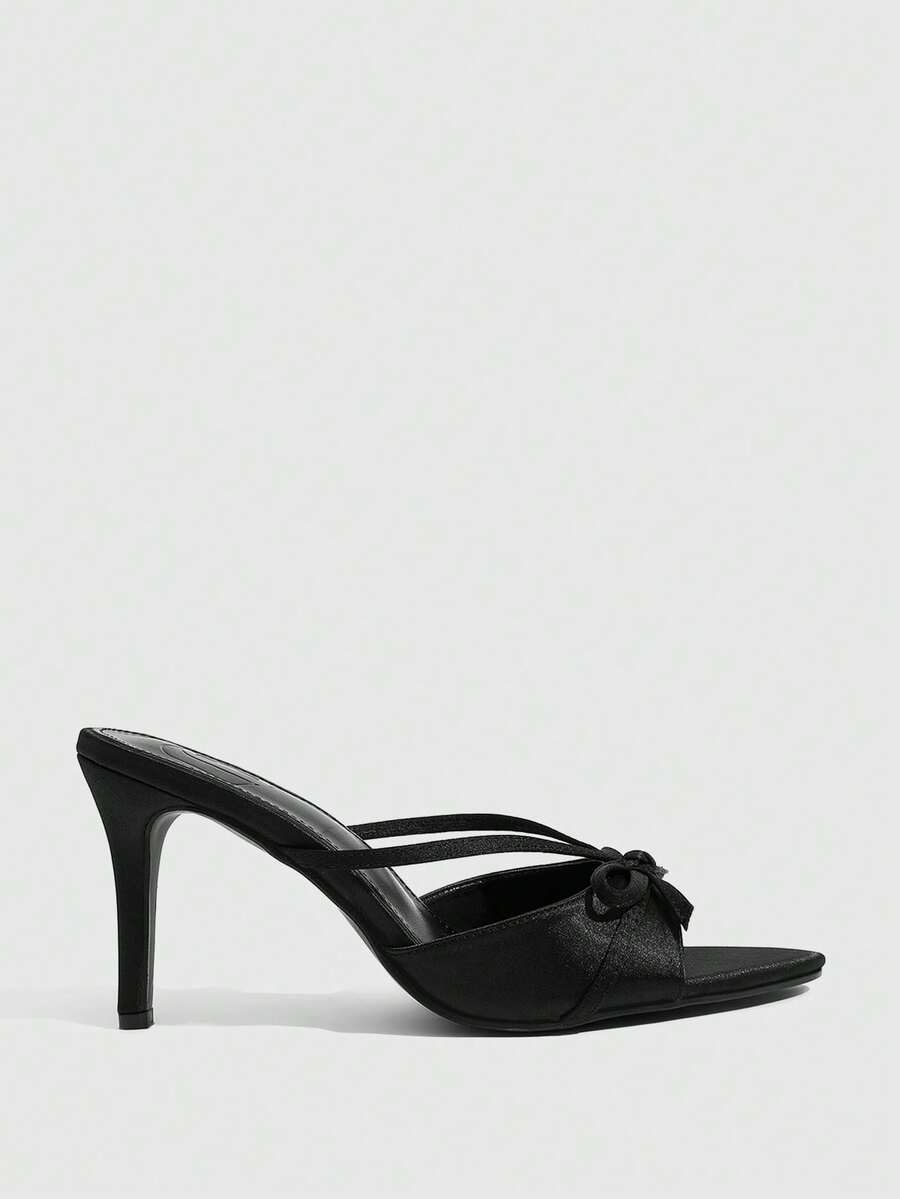 Women's brown flannel pointed open-toe heeled sandals featuring a slip-on mule design with high stiletto heels.