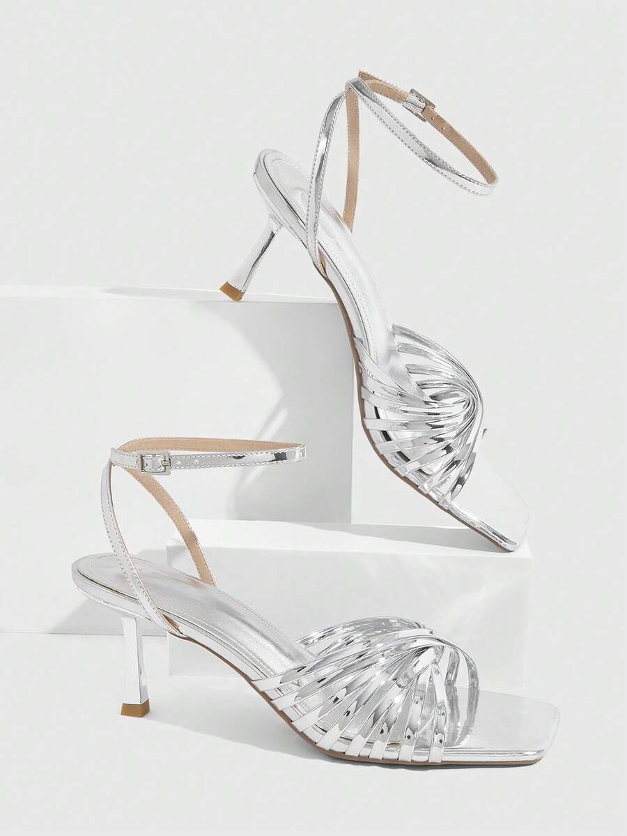 Women's open toe stiletto heel sandals featuring square toe design, criss-cross rhinestone slim straps, and secure ankle strap.