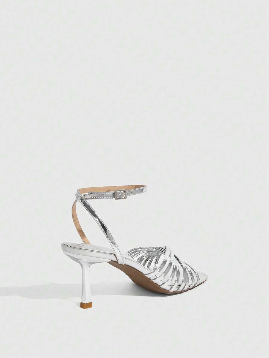 Women's open toe stiletto heel sandals featuring square toe design, criss-cross rhinestone slim straps, and secure ankle strap.