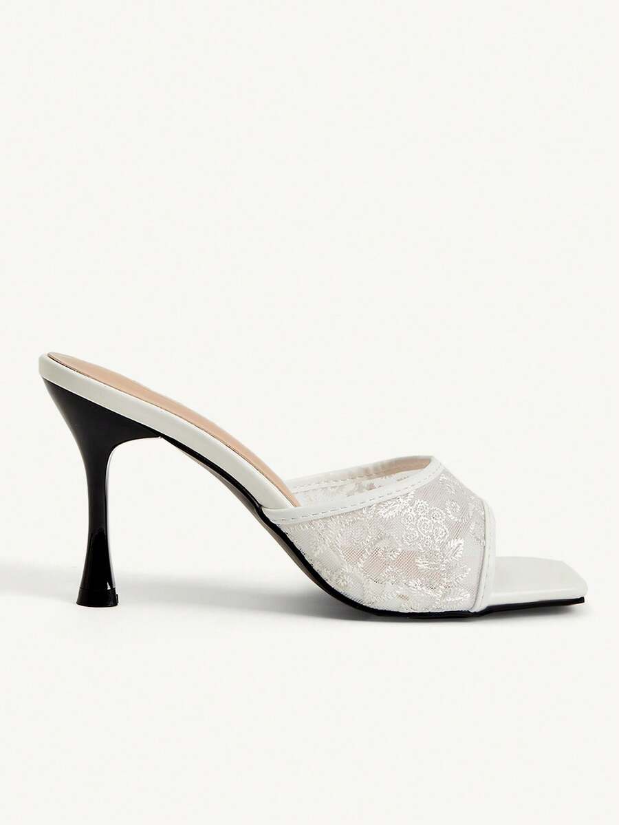 Women's square toe stiletto high heel slide sandals featuring contrast mesh embroidery and an open-toe backless design.