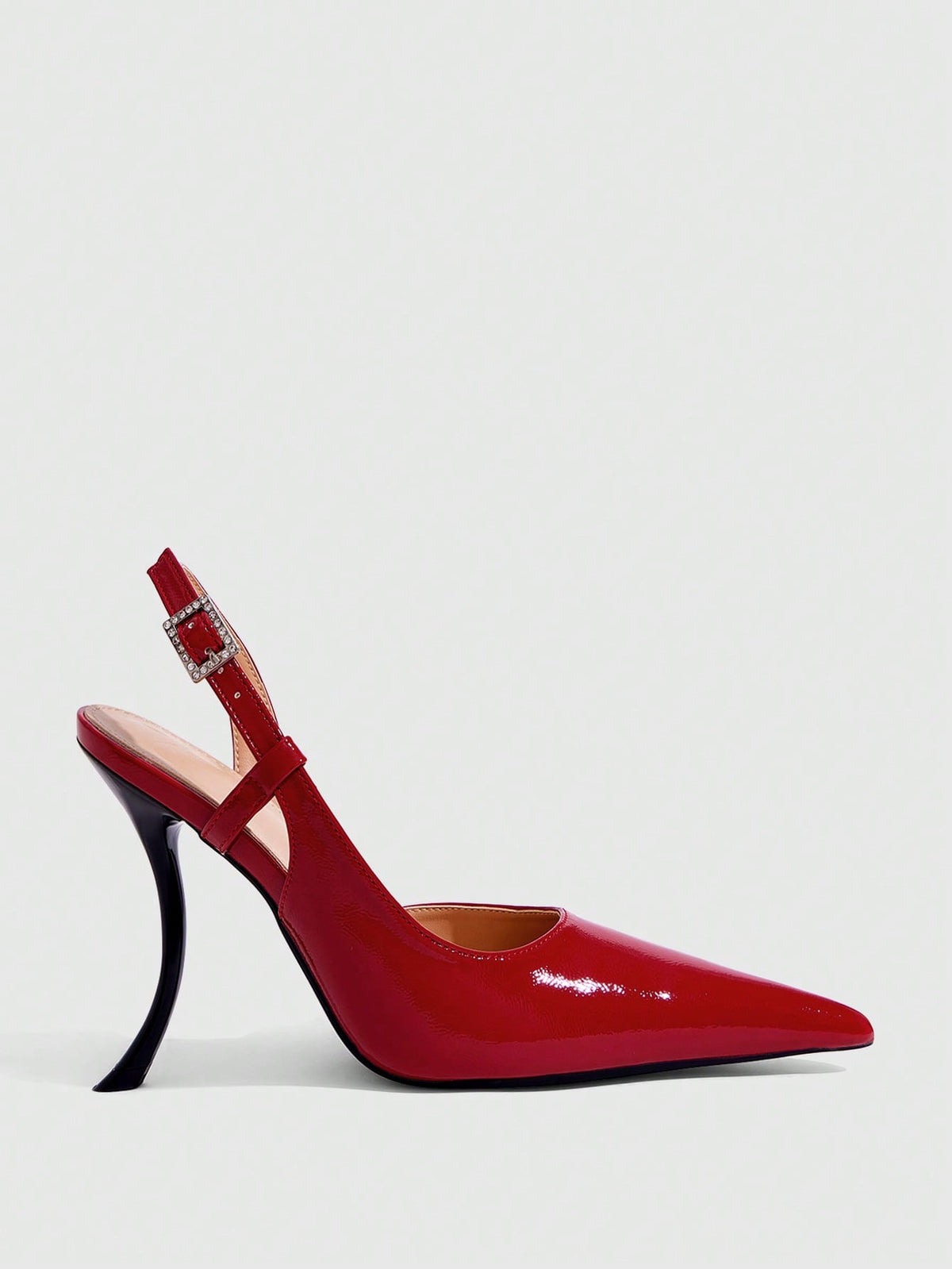 Red women's pointed-toe high heel sandals featuring a sculptural heel, rear slingback strap, and decorative buckle detail.