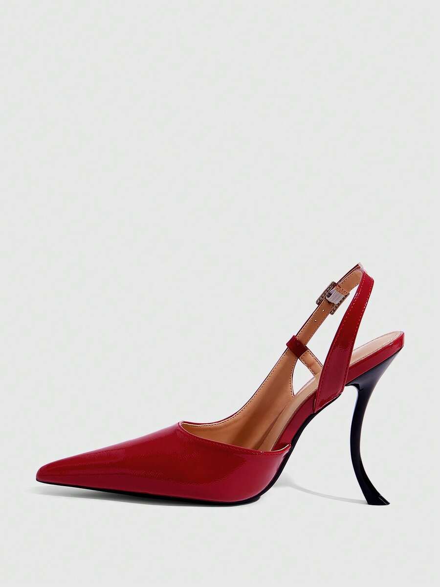 Red women's pointed-toe high heel sandals featuring a sculptural heel, rear slingback strap, and decorative buckle detail.
