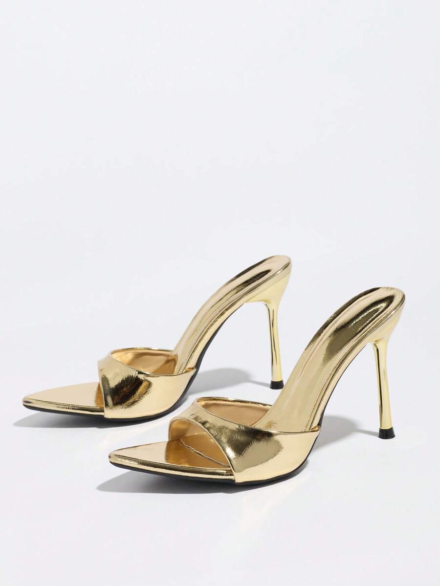 Women's elegant open toe high heel party mules featuring sleek stiletto heels and a slip-on design.