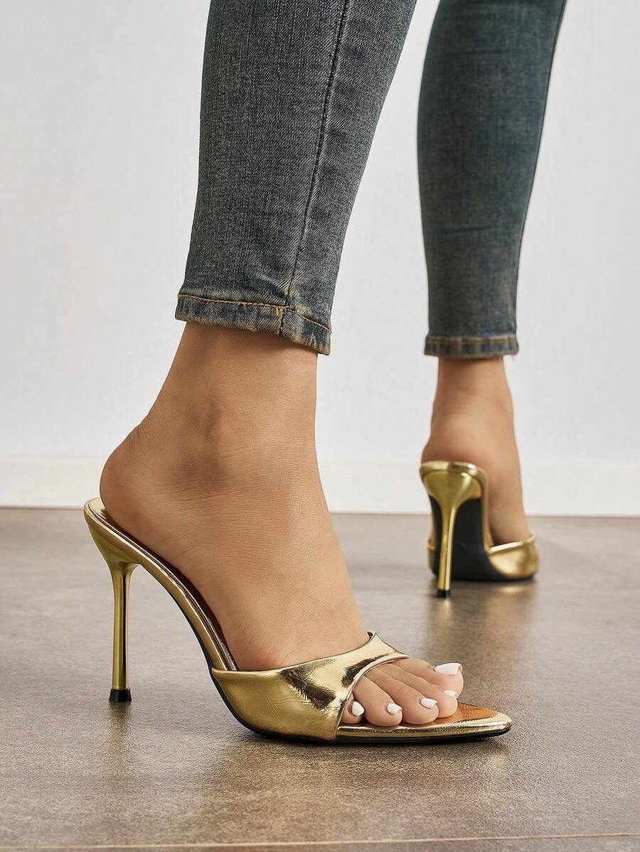 Women's elegant open toe high heel party mules featuring sleek stiletto heels and a slip-on design.