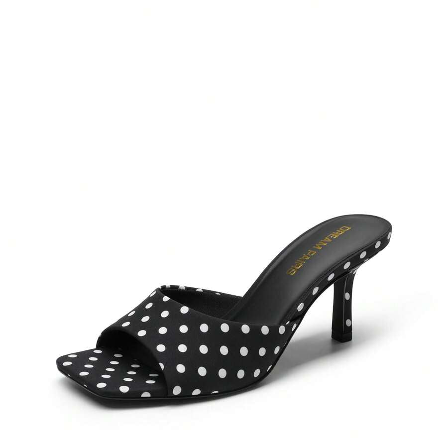 Pair of women's open square toe kitten heel mule sandals in white PU leather with slip-on styling.