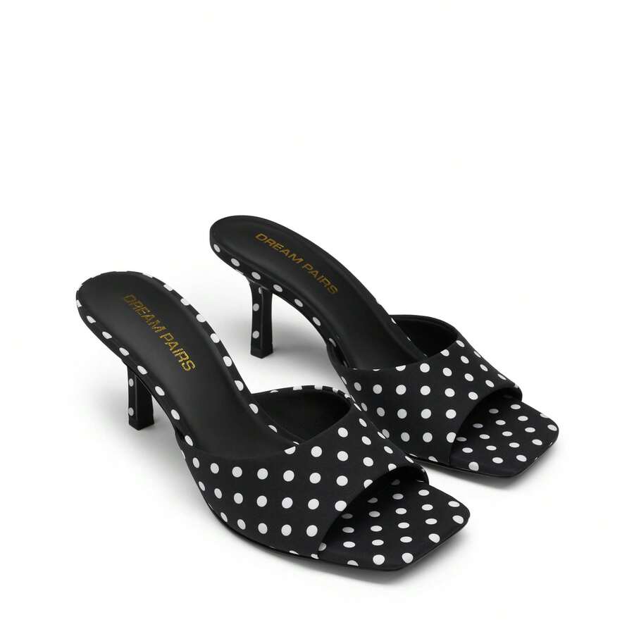 Pair of women's open square toe kitten heel mule sandals in white PU leather with slip-on styling.