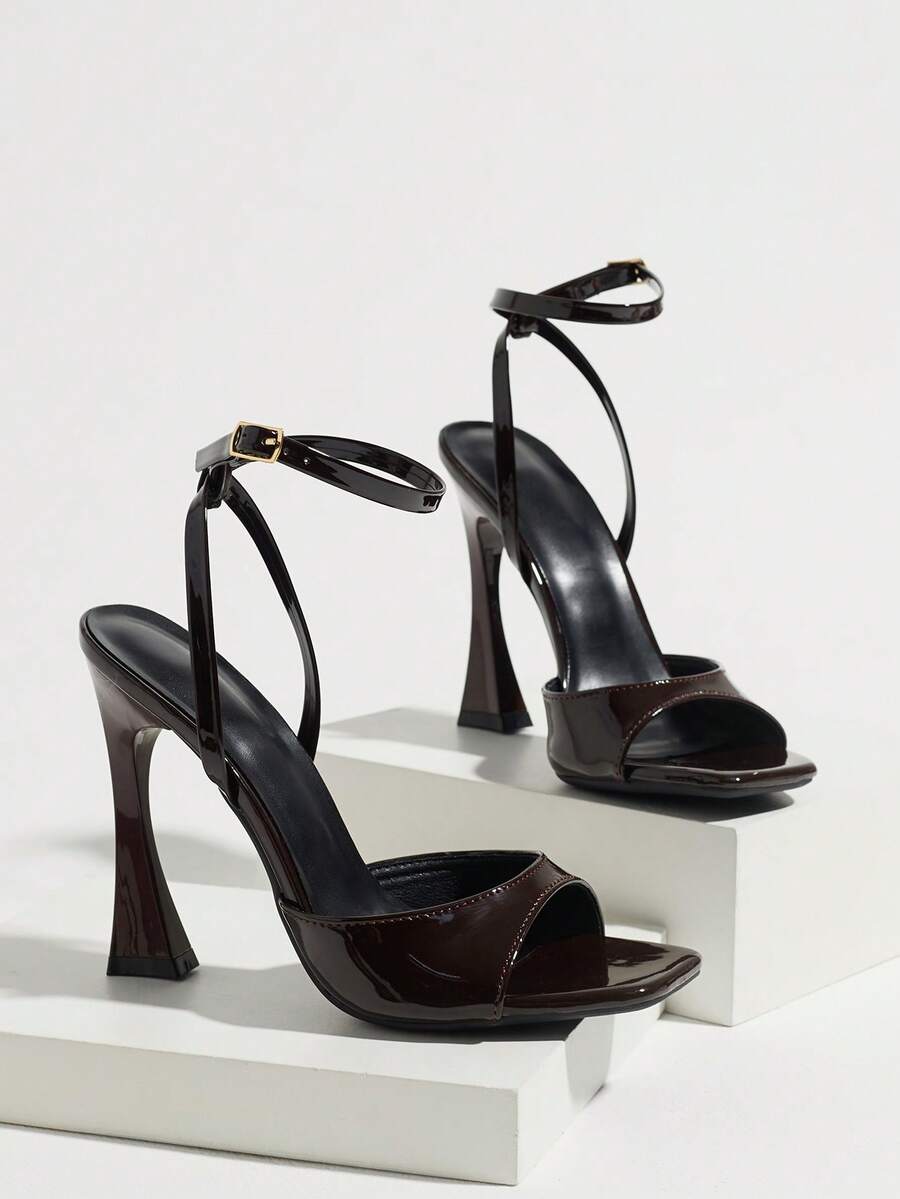 Burgundy women's square toe high heel sandals featuring a mesh bow accent and ankle strap buckle on an open toe silhouette
