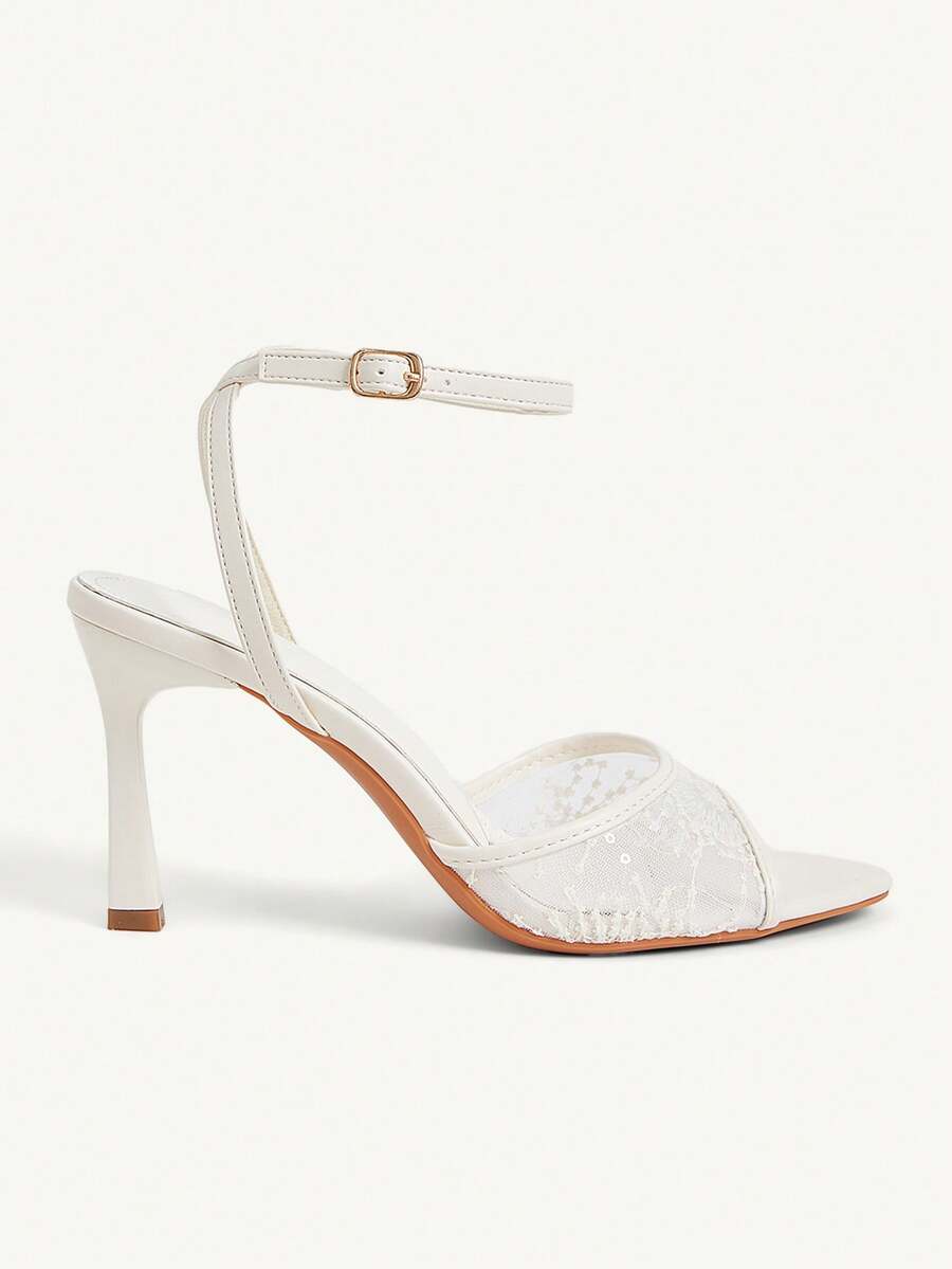 Women's open toe high heel sandals with lace mesh upper, stiletto heel, and ankle strap closure.