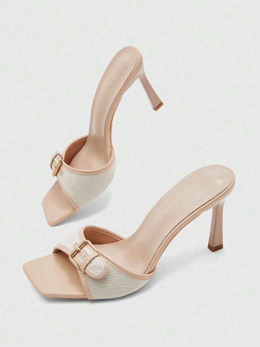 Women's brown open-toe slingback heeled sandals with stiletto heel and buckle strap.
