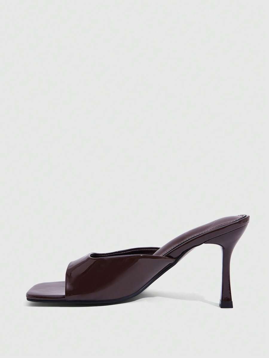 Women's elegant square toe stiletto high heel sandals featuring an open toe and sleek slingback strap