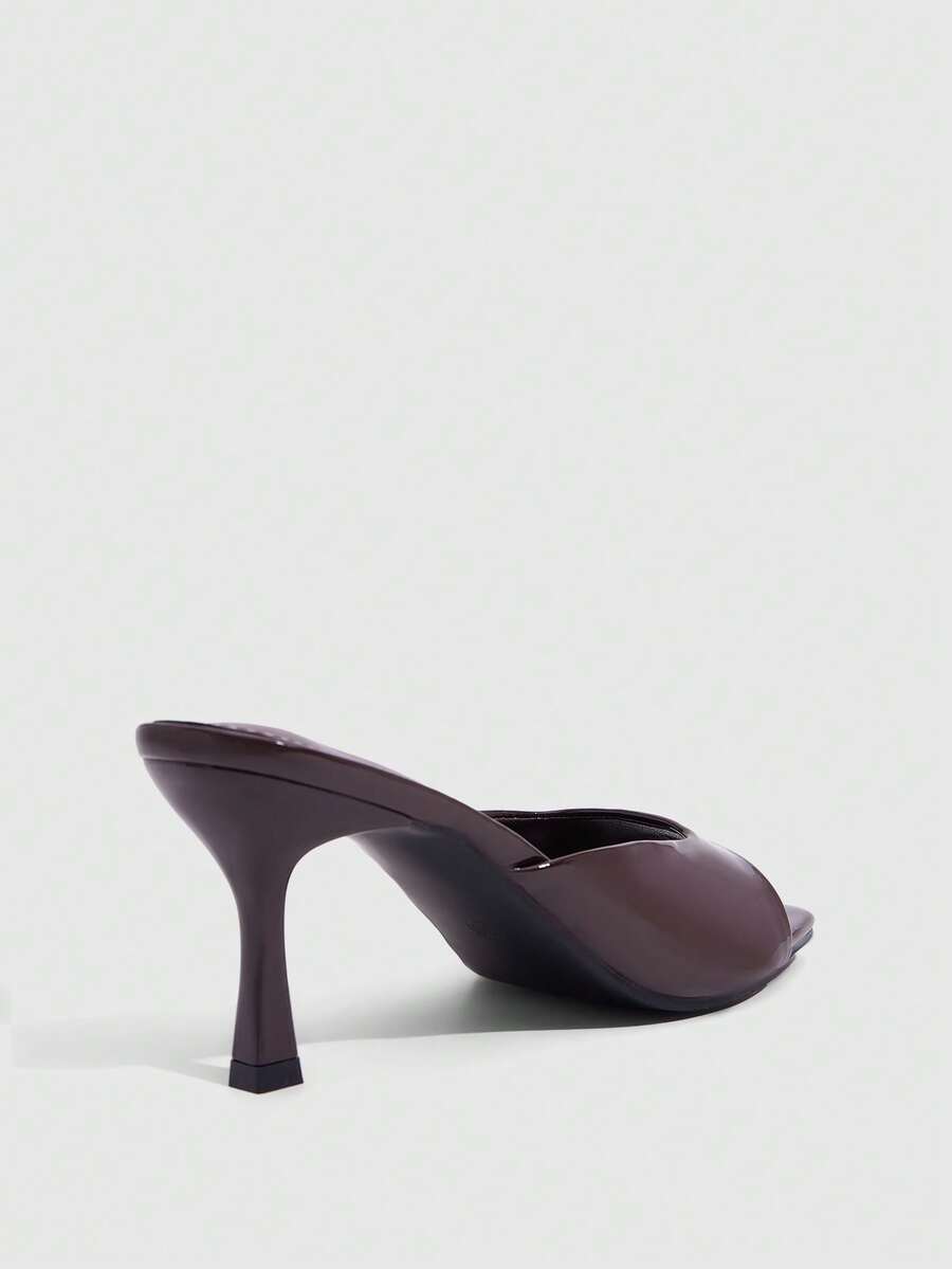 Women's elegant square toe stiletto high heel sandals featuring an open toe and sleek slingback strap
