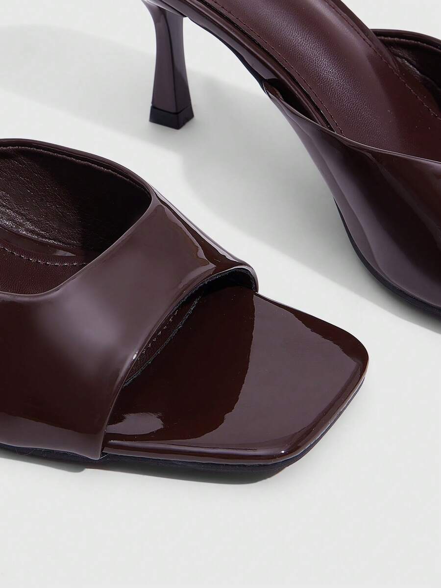 Women's elegant square toe stiletto high heel sandals featuring an open toe and sleek slingback strap