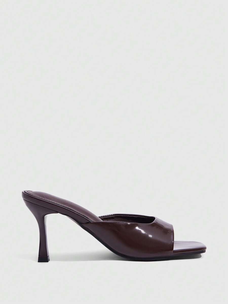 Women's elegant square toe stiletto high heel sandals featuring an open toe and sleek slingback strap