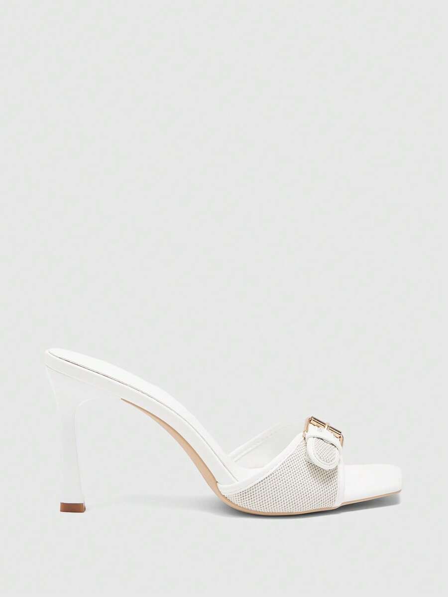 Women's brown open-toe slingback heeled sandals with stiletto heel and buckle strap.