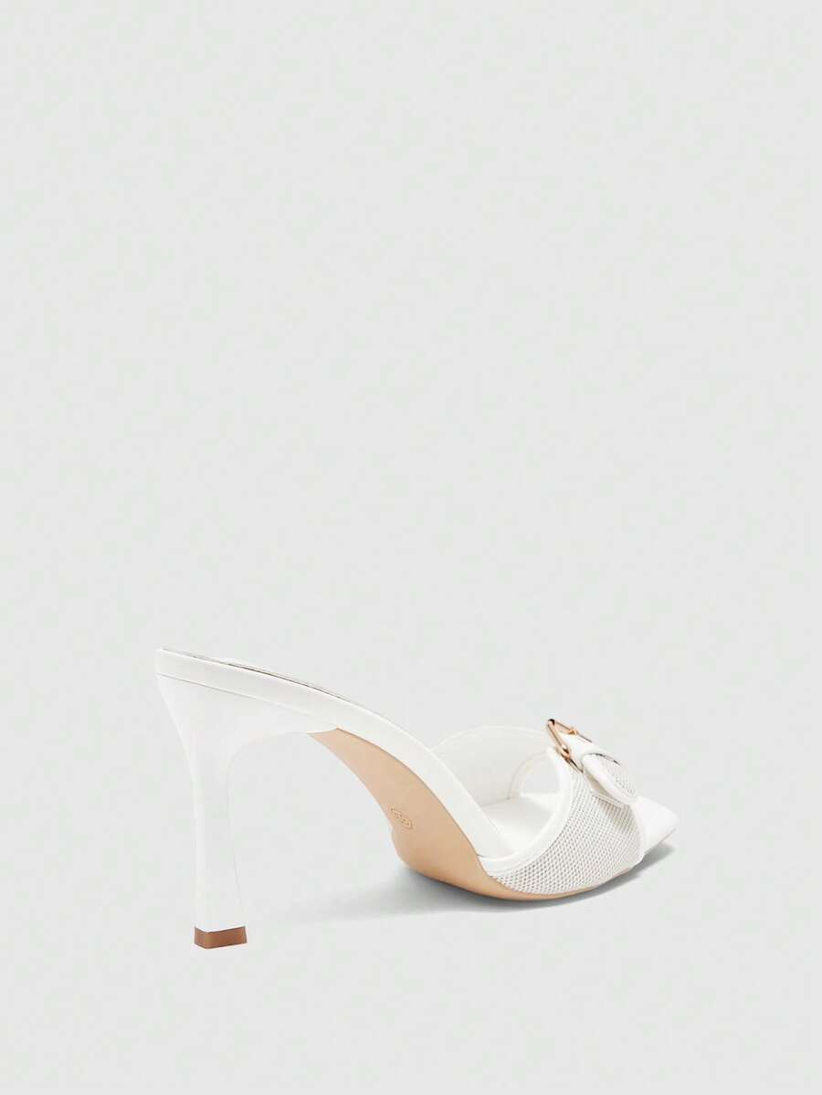 Women's brown open-toe slingback heeled sandals with stiletto heel and buckle strap.