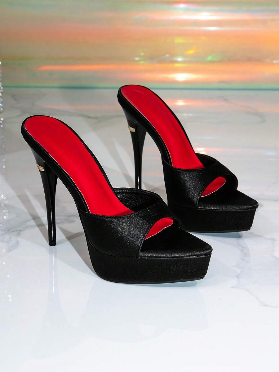 Women's thick platform high heel sandals featuring a pointed open toe design, ultra high stiletto heel, and sleek ankle slingback strap.