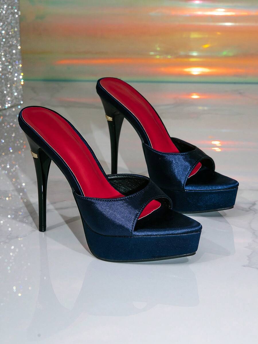 Women's thick platform high heel sandals featuring a pointed open toe design, ultra high stiletto heel, and sleek ankle slingback strap.