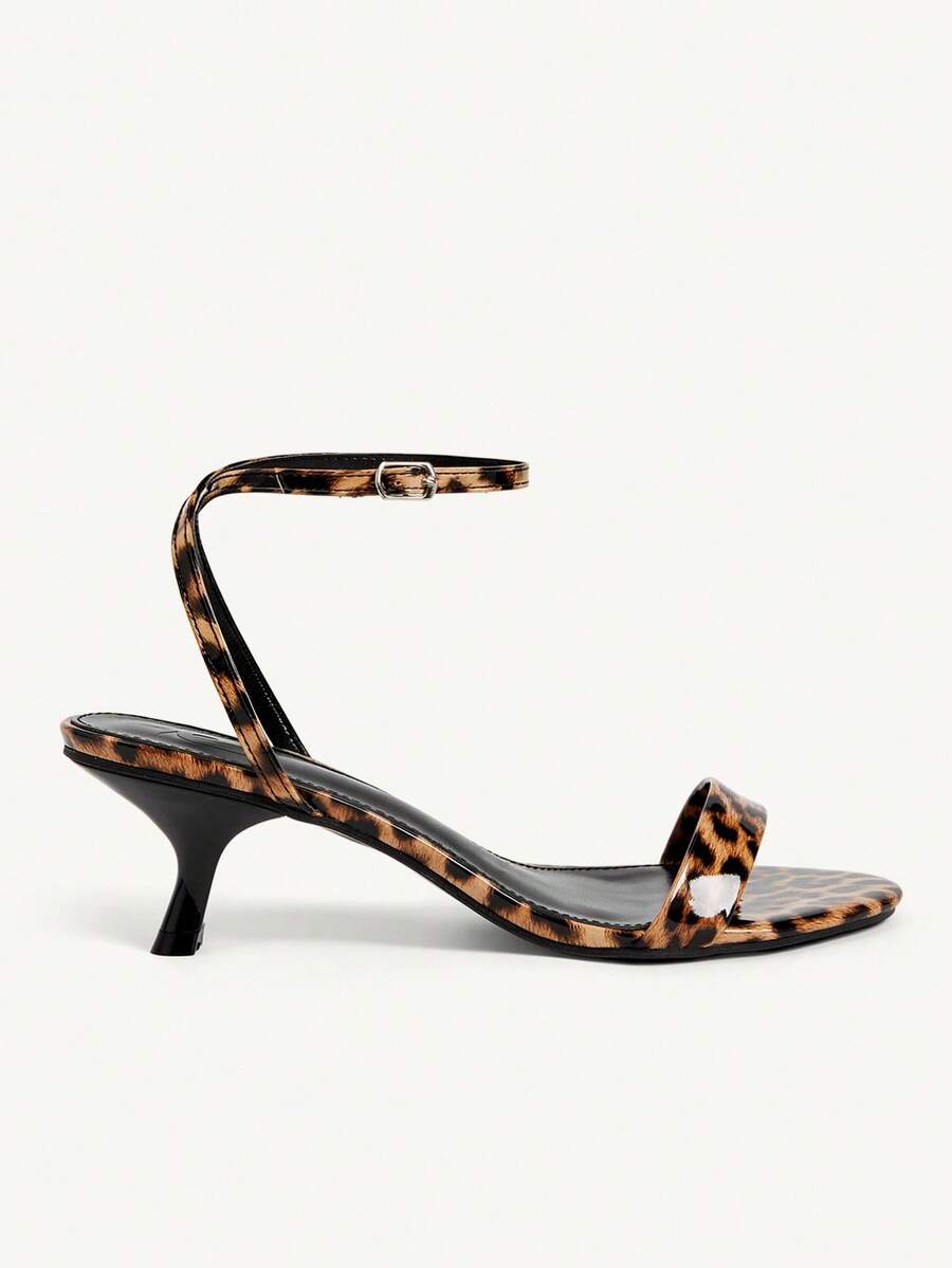 Women's open-toed high-heeled sandals featuring a 5.5cm kitten heel stiletto, sleek ankle strap with buckle closure, and smooth PU leather finish.
