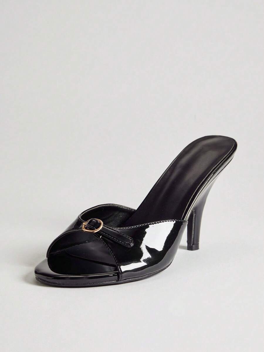 Women's slip-on heeled sandals with metal-coated stiletto heels and lock decoration in chocolate brown PU leather.