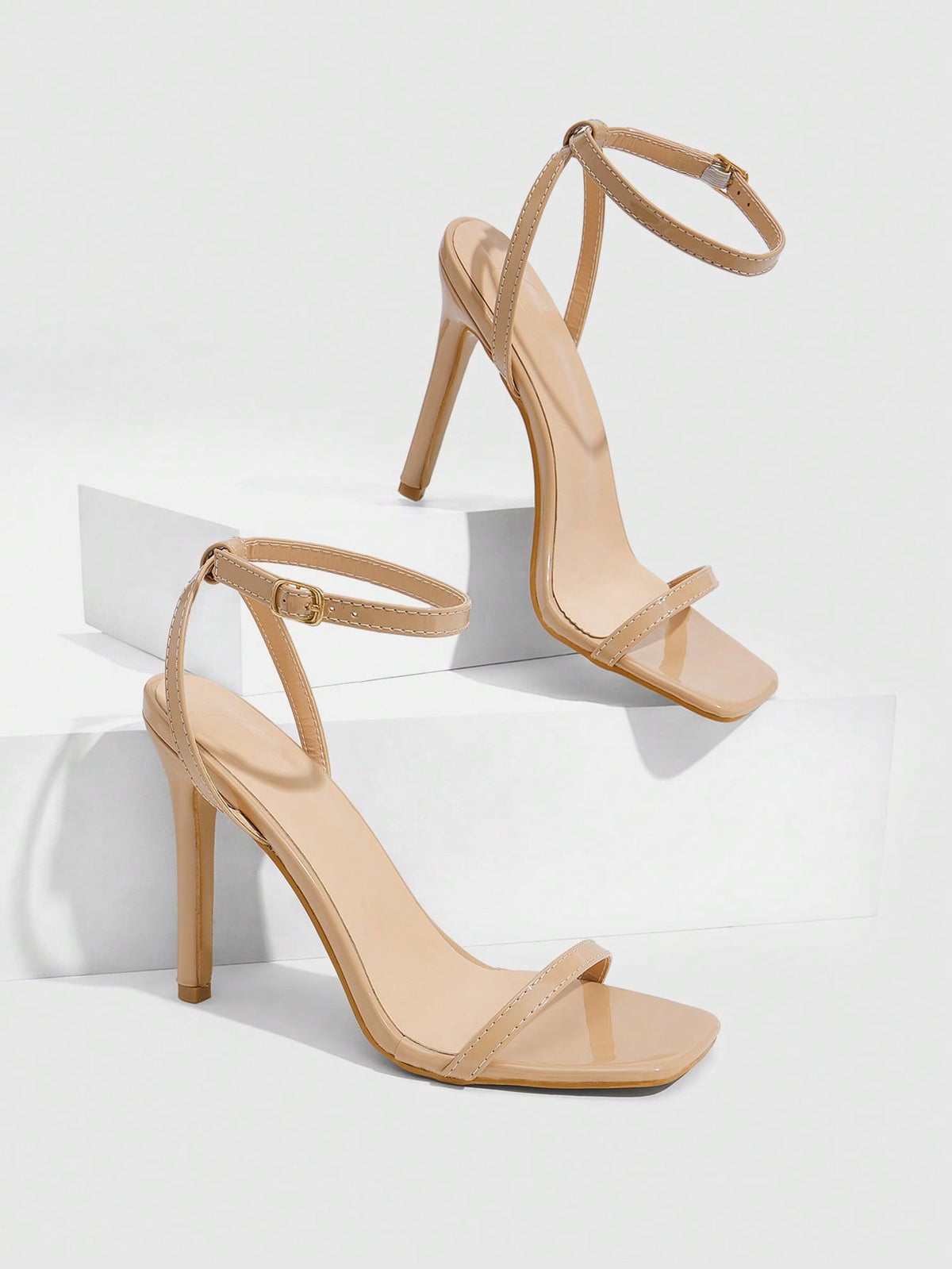 Square toe high-heeled sandals with thin straps, stiletto heel, and buckle ankle strap