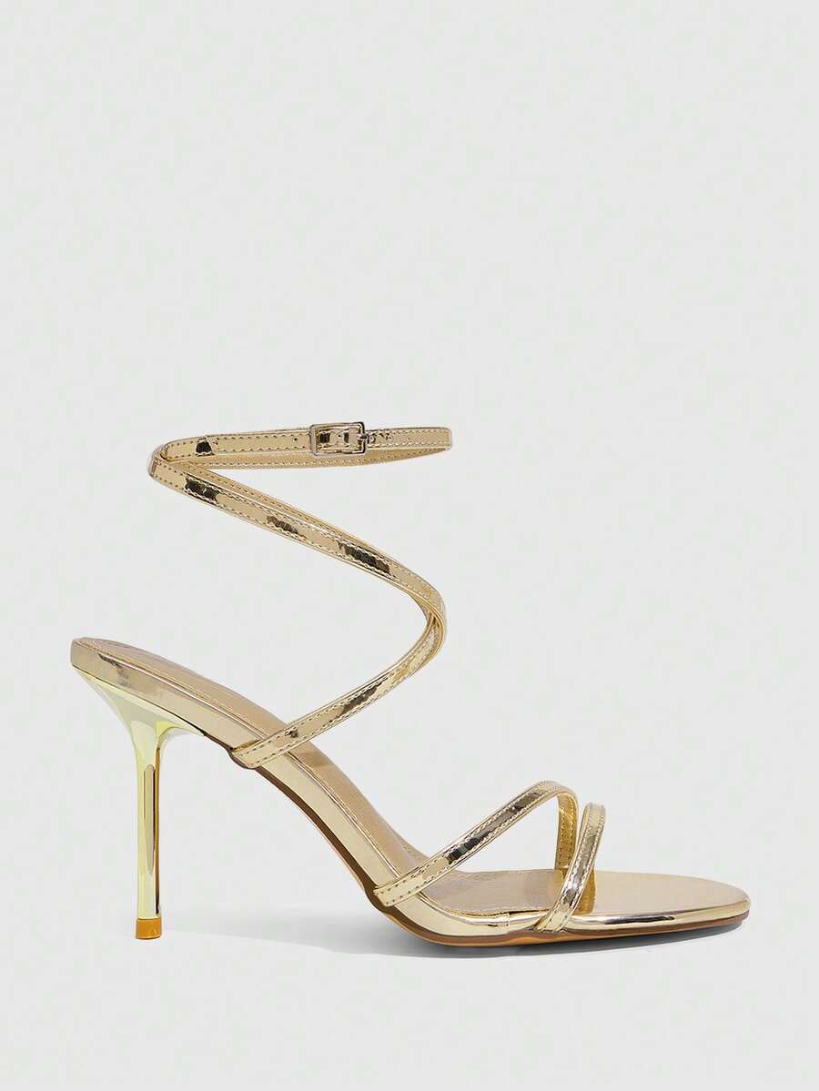 Women's square toe stiletto high heeled sandals with ankle strap buckle in a sleek faux leather finish.