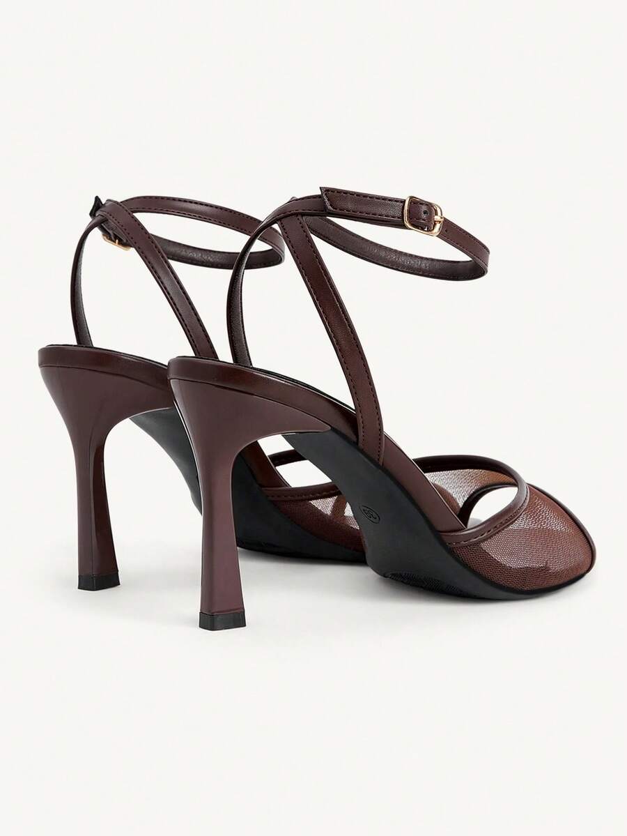 Women's open toe high heel sandals with lace mesh upper, stiletto heel, and ankle strap closure.