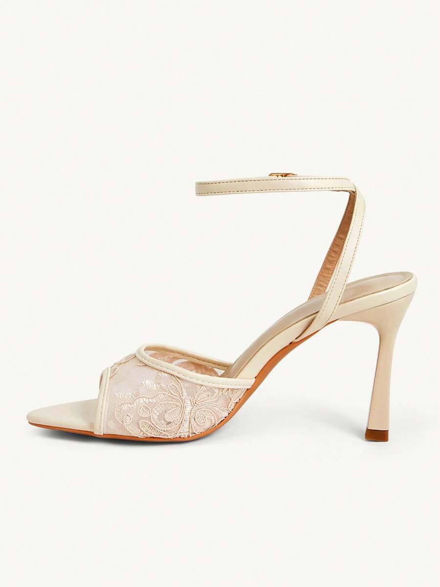 Women's open toe high heel sandals with lace mesh upper, stiletto heel, and ankle strap closure.