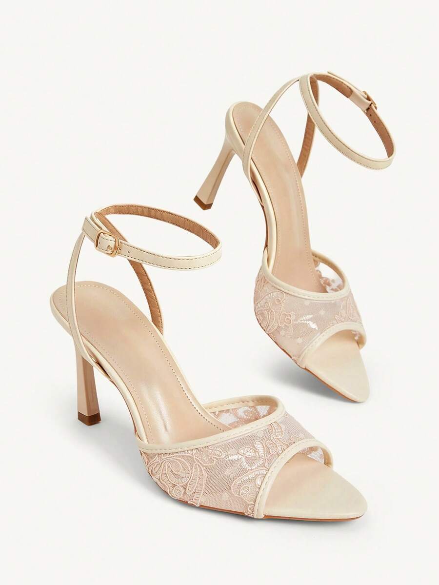Women's open toe high heel sandals with lace mesh upper, stiletto heel, and ankle strap closure.
