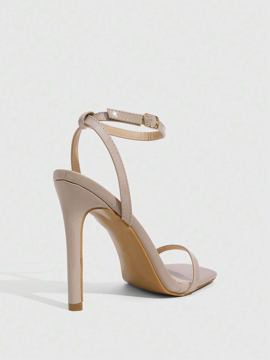 Square toe high-heeled sandals with thin straps, stiletto heel, and buckle ankle strap