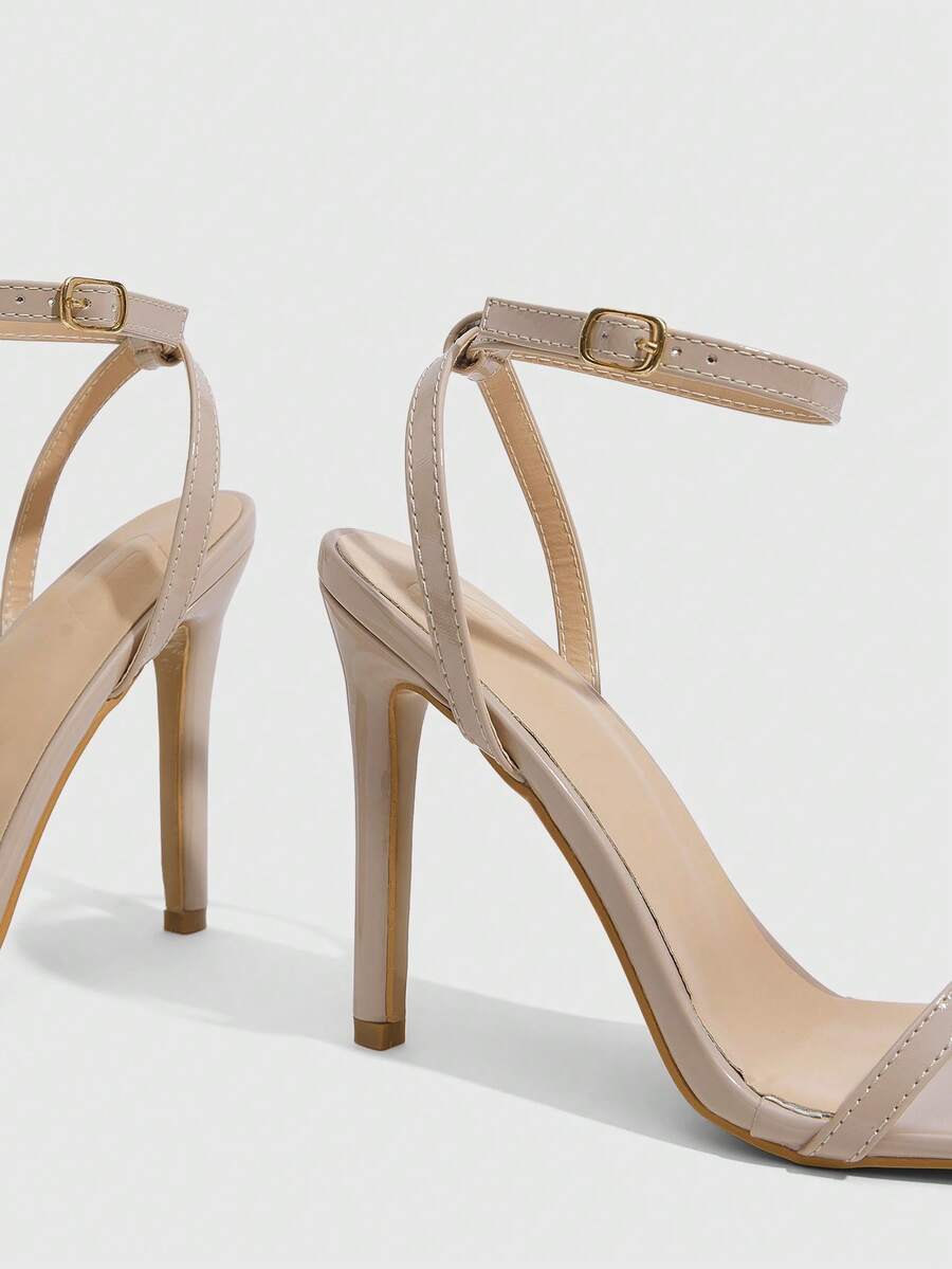 Square toe high-heeled sandals with thin straps, stiletto heel, and buckle ankle strap