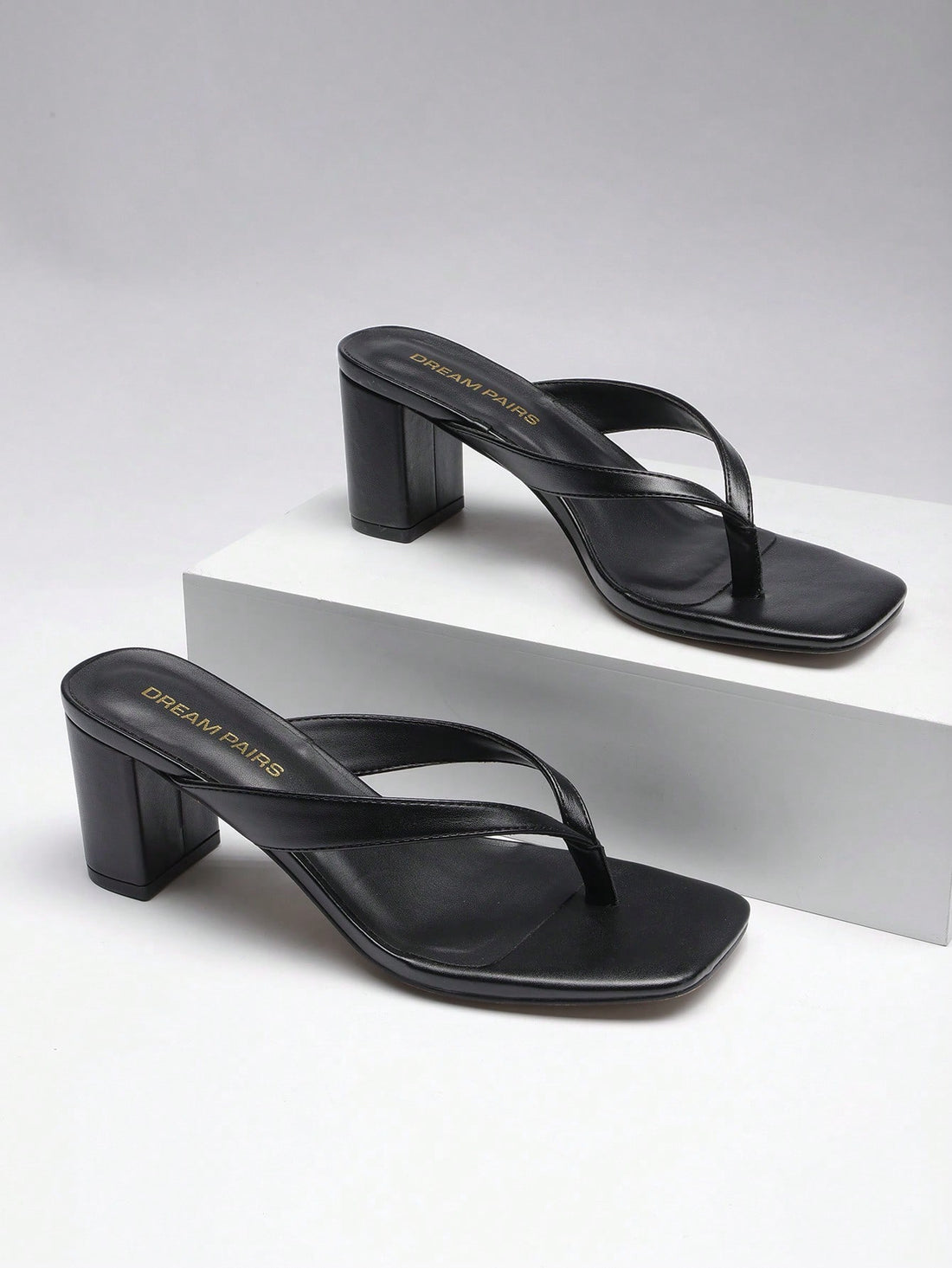 Women's chunky low heel thong sandals featuring a square open toe and slip-on flip-flop strap design