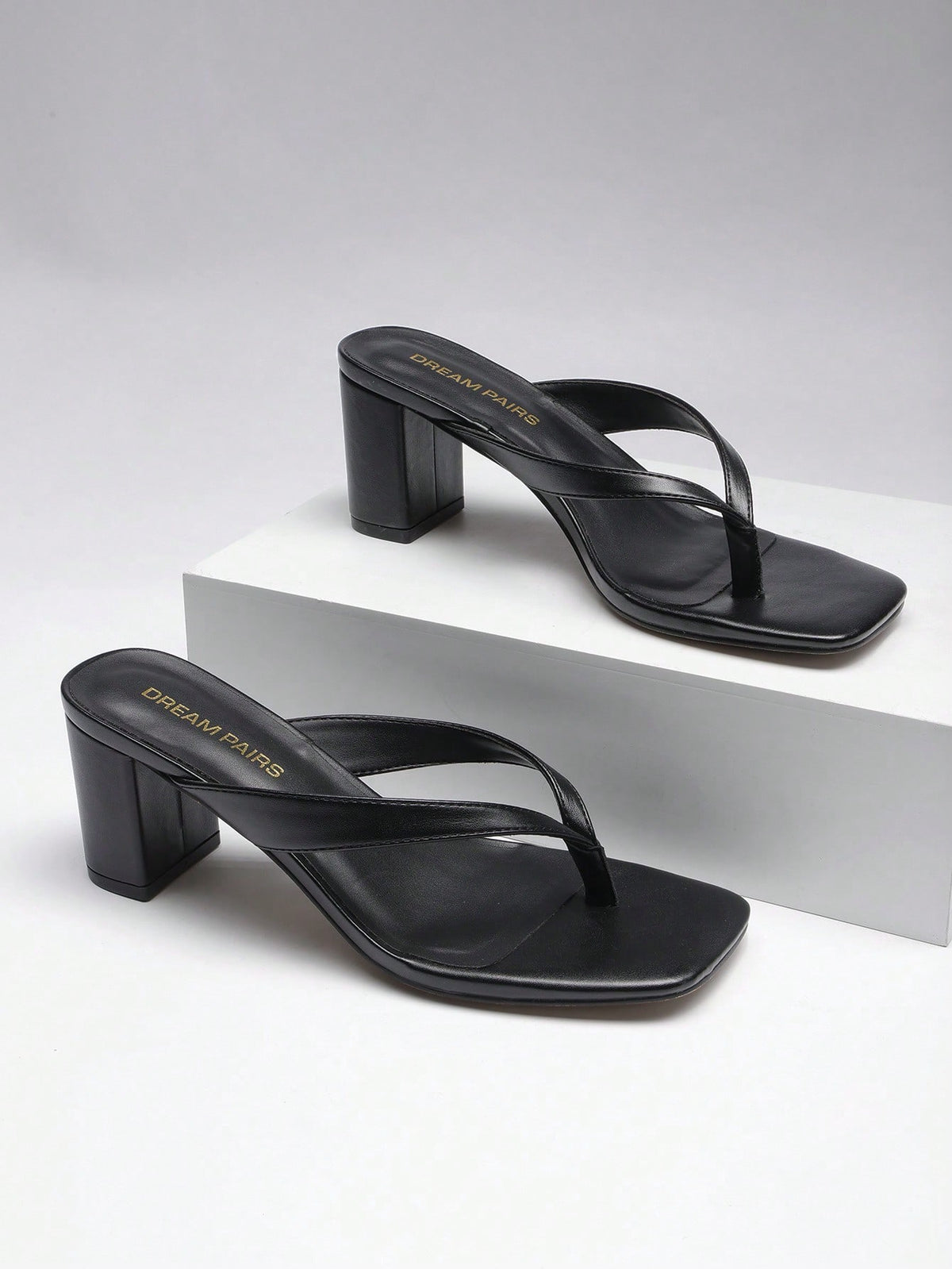 Women's chunky low heel thong sandals featuring a square open toe and slip-on flip-flop strap design