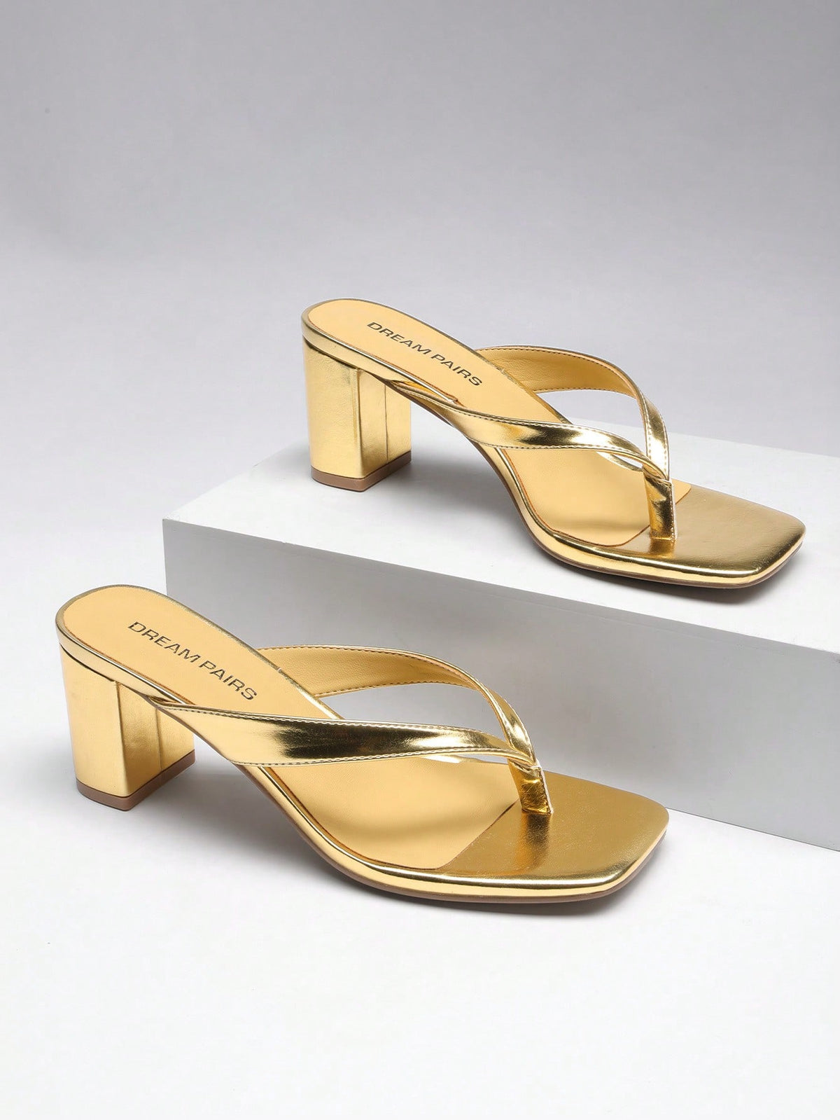 Women's chunky low heel thong sandals featuring a square open toe and slip-on flip-flop strap design