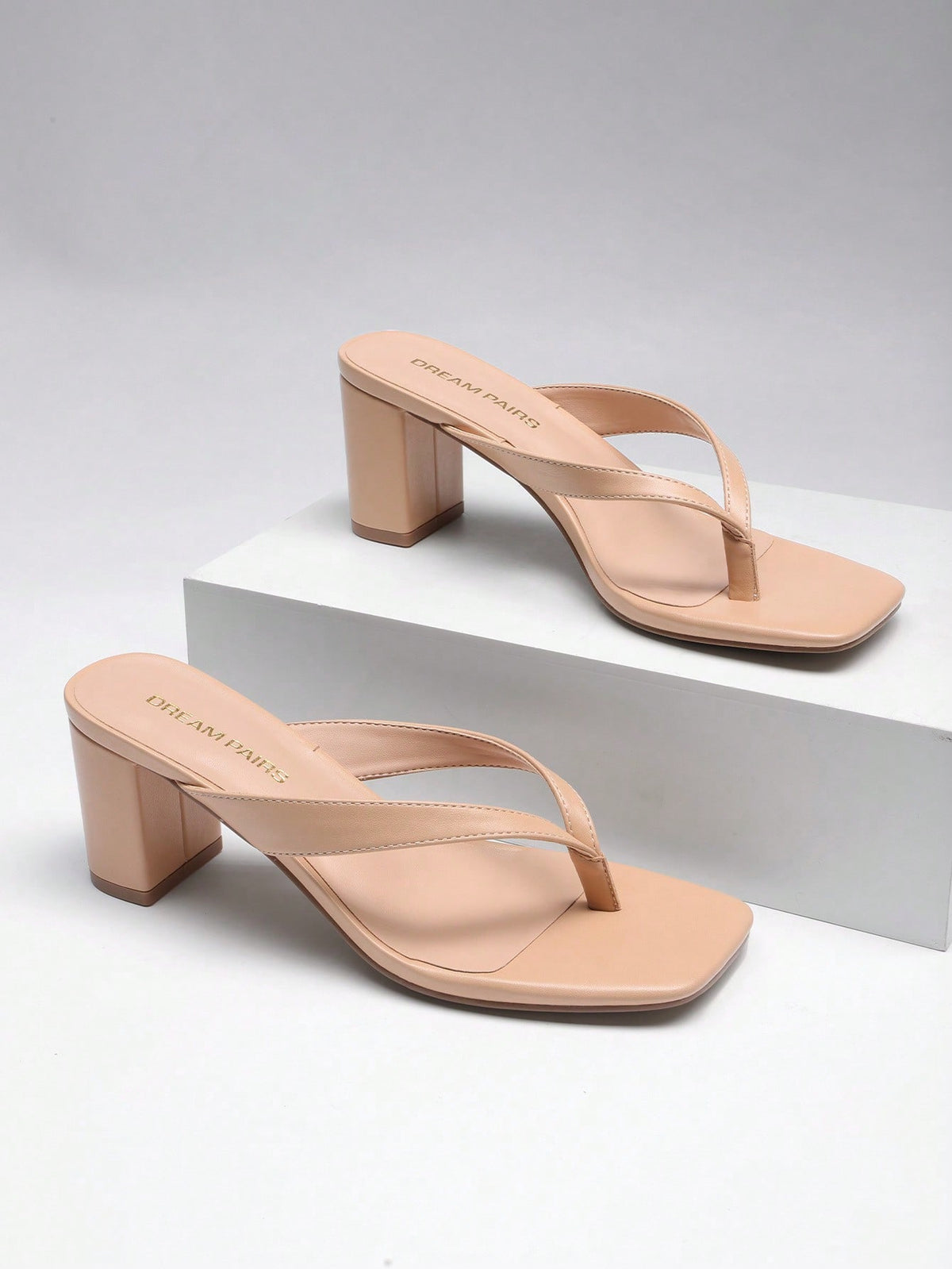 Women's chunky low heel thong sandals featuring a square open toe and slip-on flip-flop strap design
