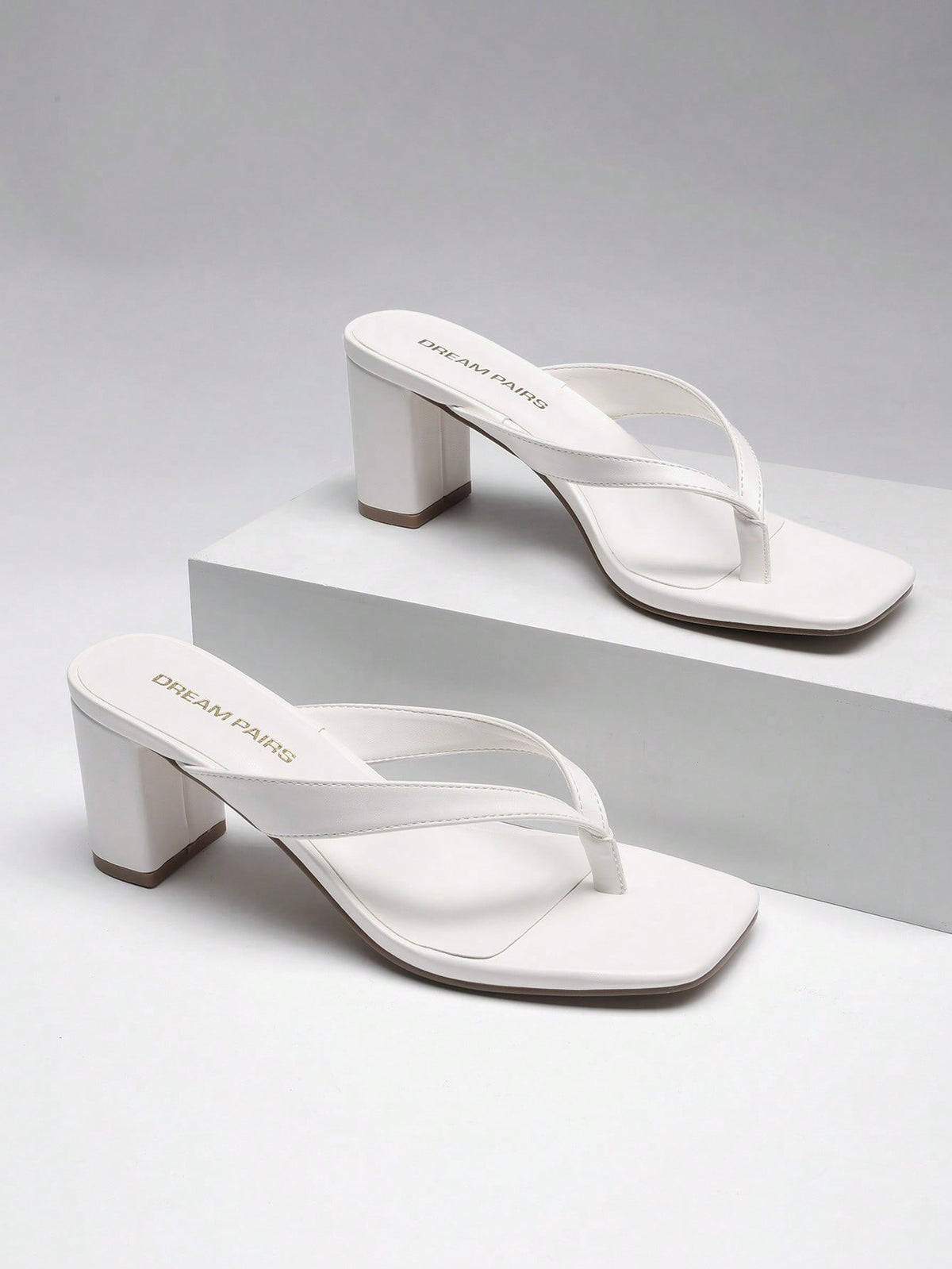 Women's chunky low heel thong sandals featuring a square open toe and slip-on flip-flop strap design
